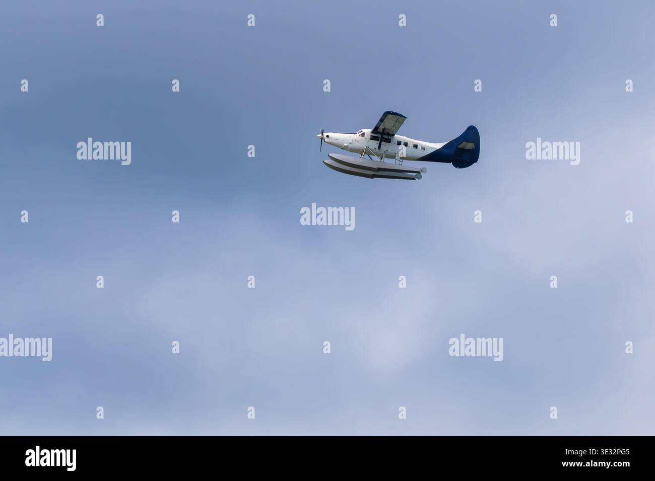 Seaplane flying against clear sky Stock Photo