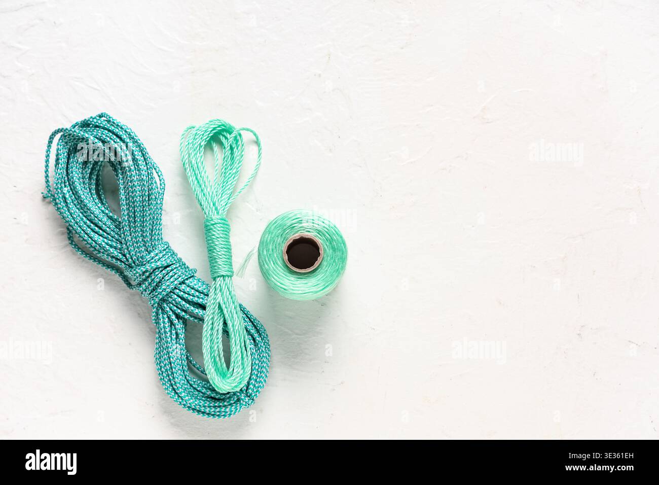 Different ropes on light background Stock Photo