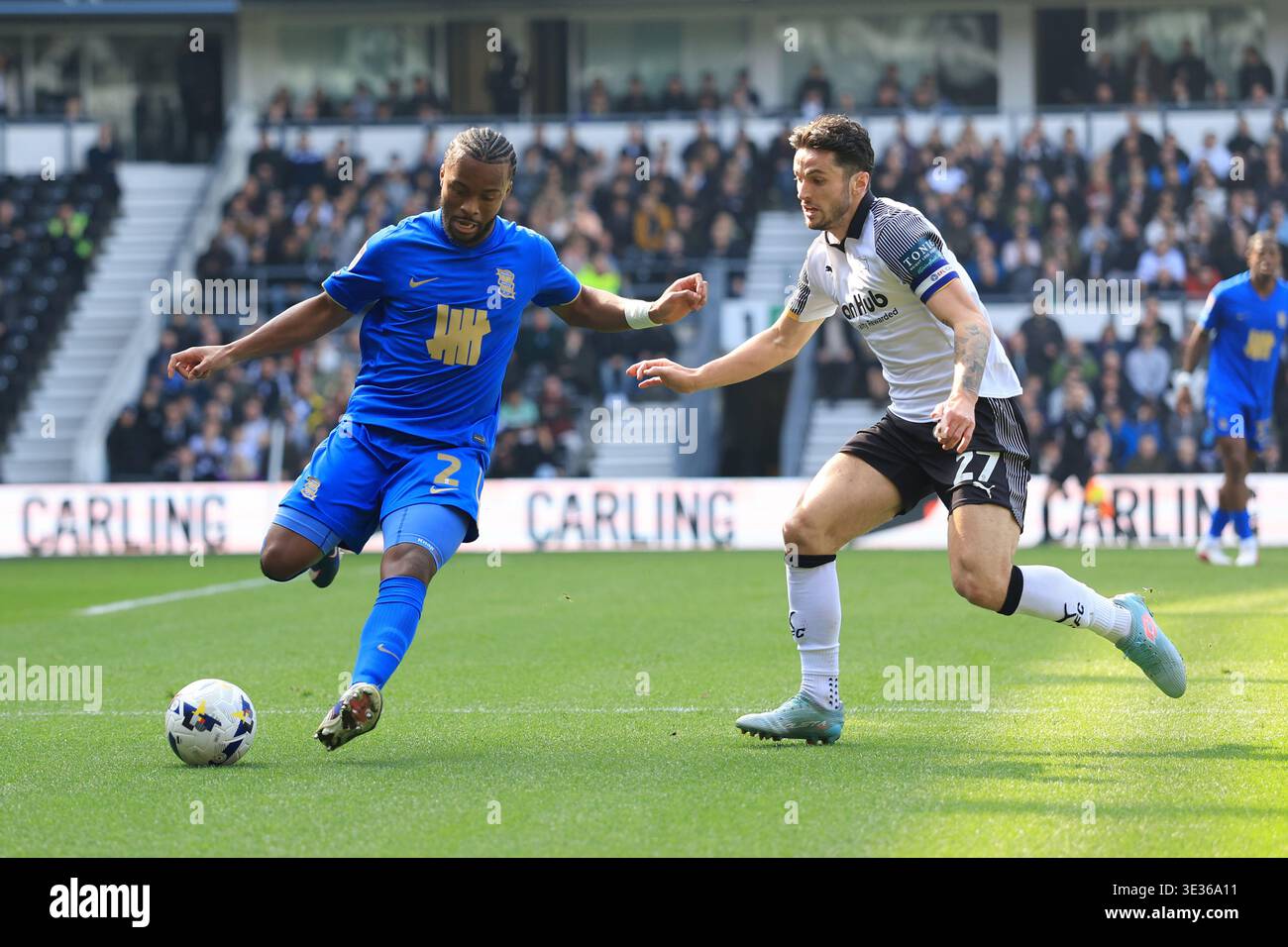 Travis Laird (left) Birmingham City's Ethan Laird and Derby County's Lewis Travis ...