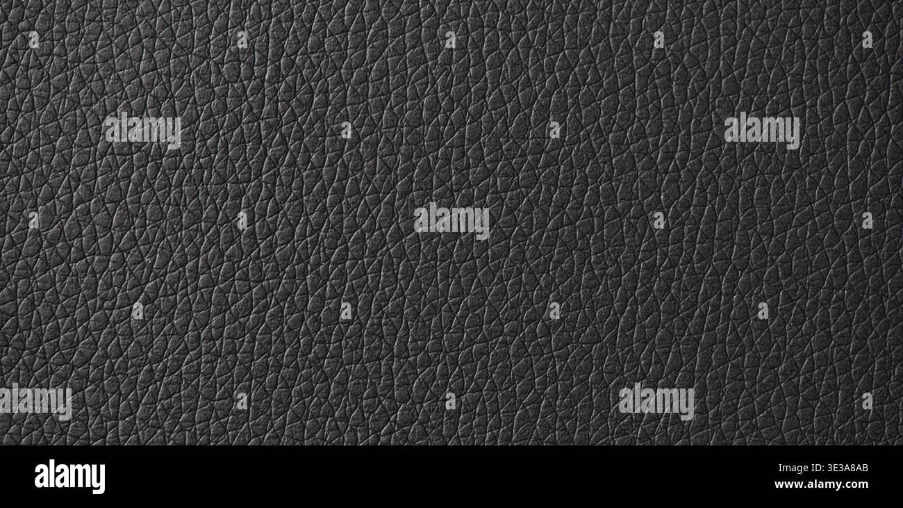 Black leather surface displaying a detailed and textured material background Stock Photo