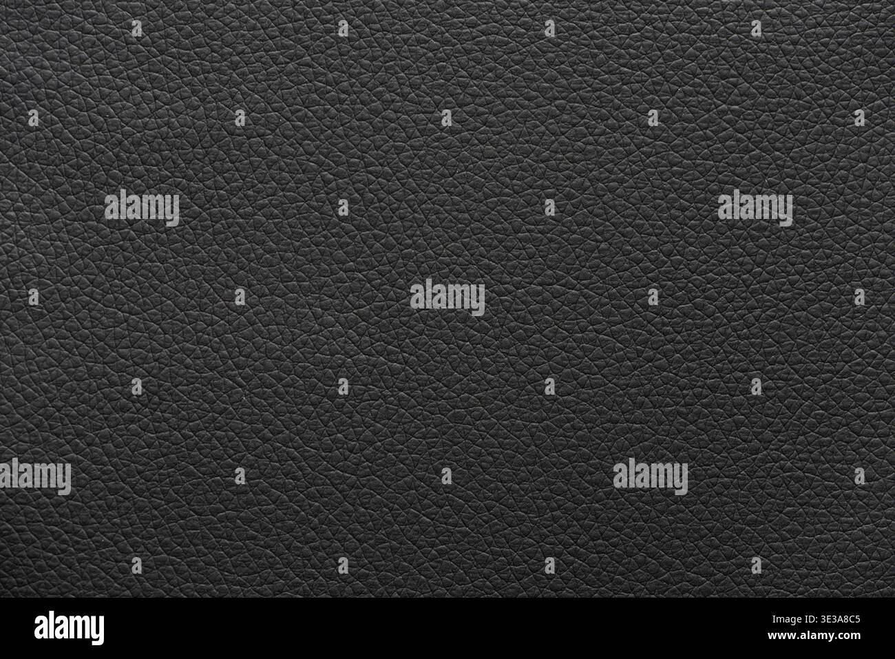 Black leather surface displaying a detailed and textured material background Stock Photo