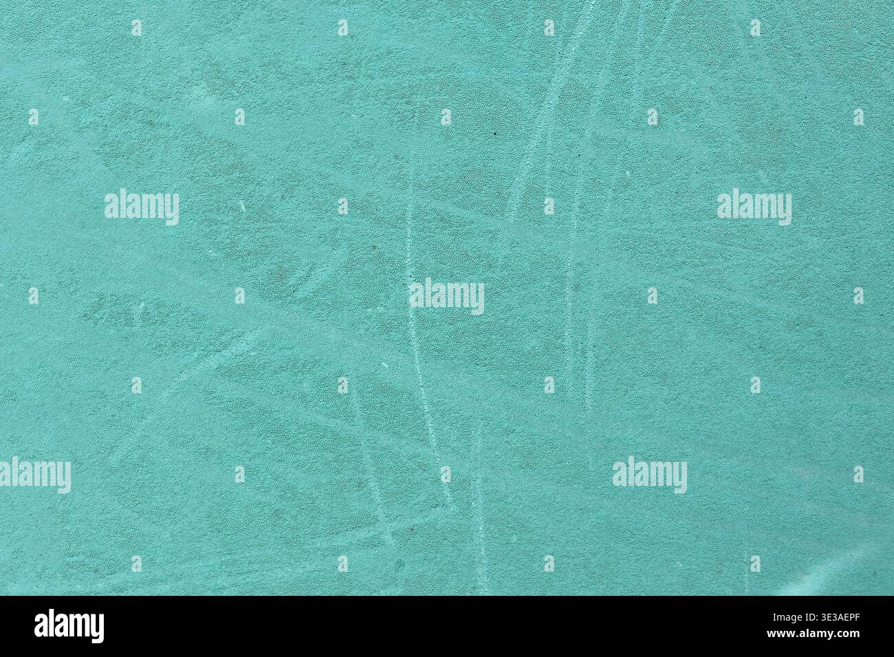 Turquoise textured background with subtle scratches and grainy surface pattern Stock Photo