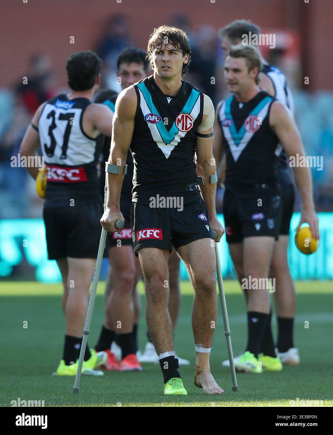 Conner Rozee Injuries Connor Rozee of the Power on crutches after the AFL Round 2 match ...