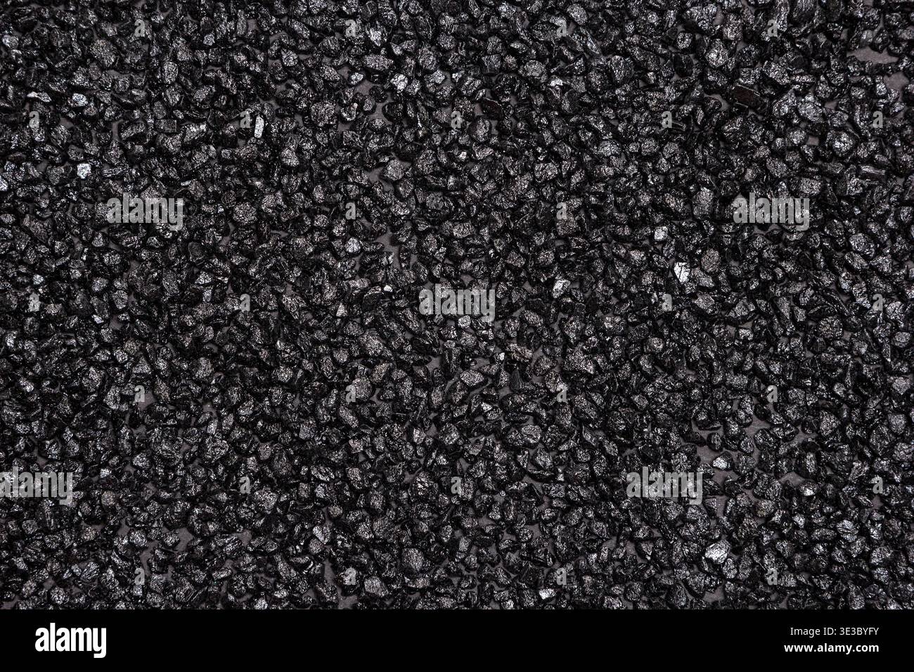 Anthracite surface texture. Black small stones background Stock Photo