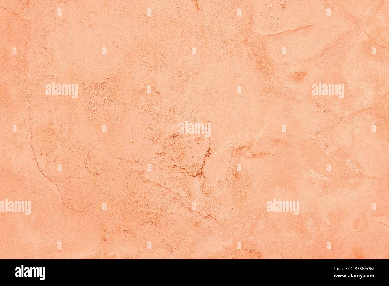 Old cement plaster wall texture. Peach color painted background Stock Photo