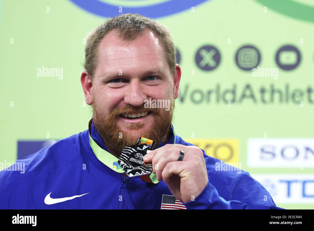 Jordan Geist, of the United States, poses on the podium after winning ...