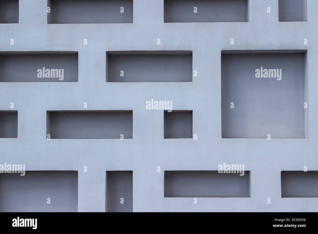 A blueish colored patterned concrete wall. Background Stock Photo