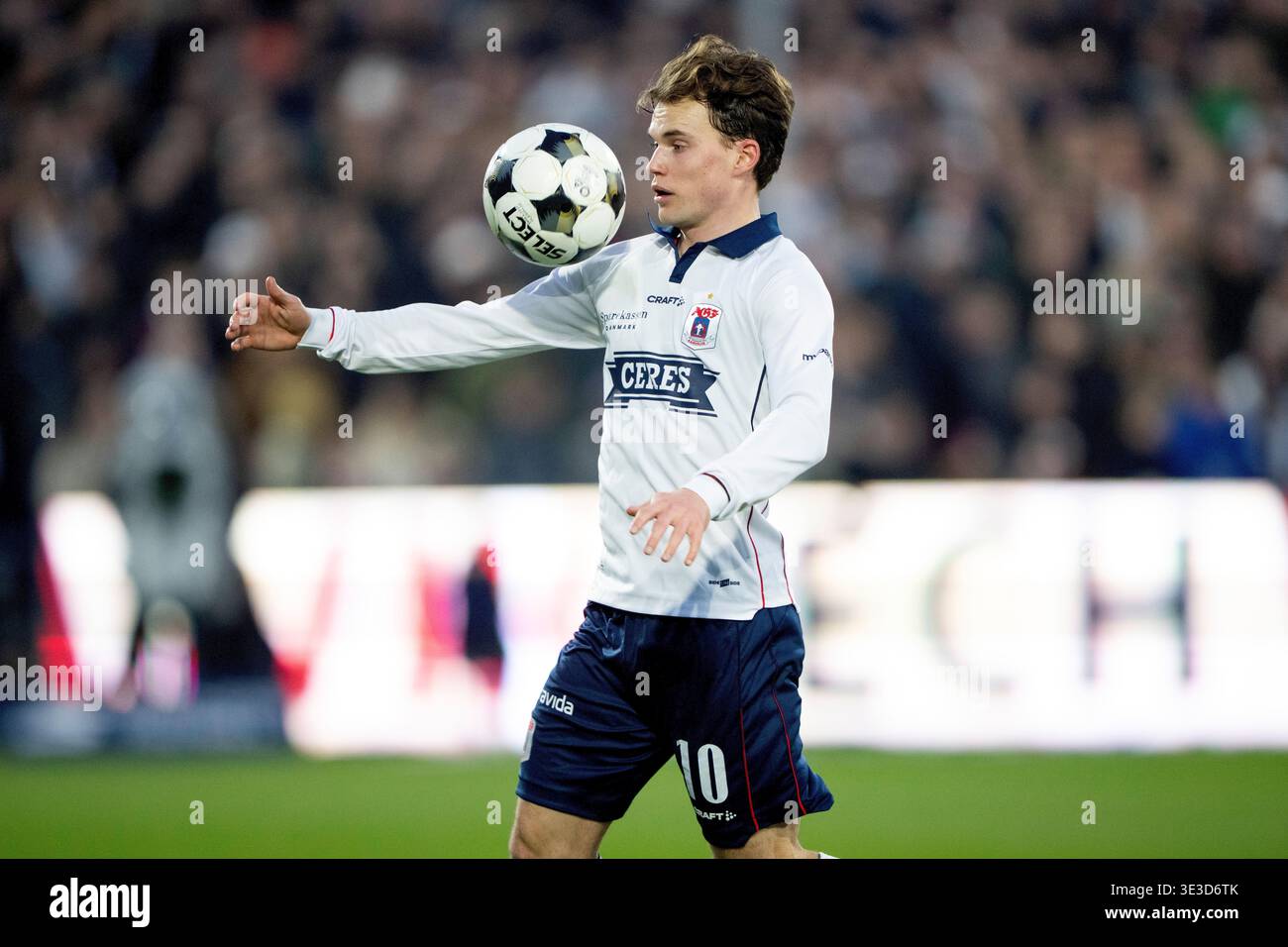 Aarhus, Denmark. 22nd Mar, 2026. AGF's Kristian Arnstad in action during the Super League match in the championship game between AGF and Broendby IF at Ceres Park Vejlby in Aarhus on Sunday, Aarhus, Denmark. 22nd Mar, 2026. AGF's Kristian Arnstad in action during the Super League match in the championship game between AGF and Broendby IF at Ceres Park Vejlby in Aarhus on Sunday,