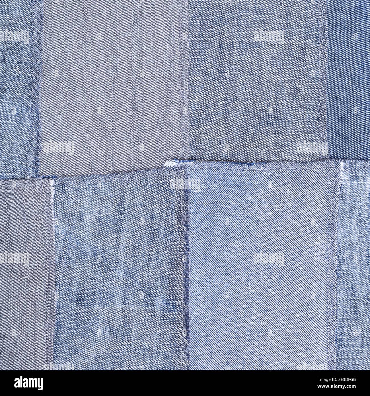 Patchwork square textile background from old denim flaps Stock Photo