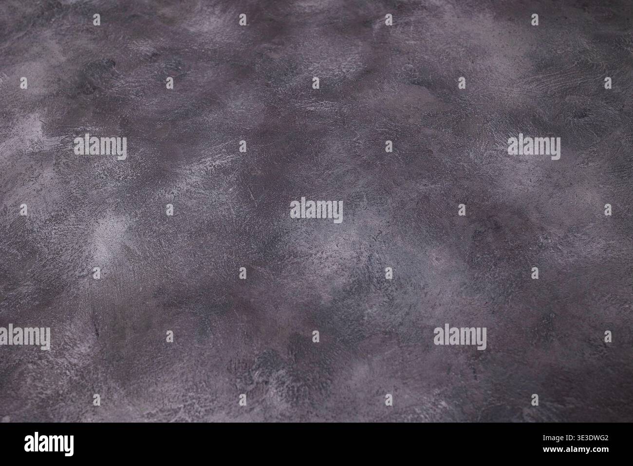 Abstract gray grunge concrete texture background with subtle rainbow light Stock Photo