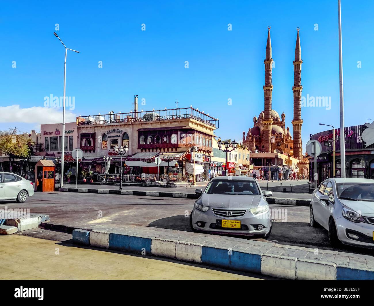 Egypt, Sharm El Sheikh - January 17, 2020: Cityscape of an Old Market with Al-Sahaba Mosque in the tourist city of Sharm El Sheikh. East tropical town - Smartphone Captured Stock Image