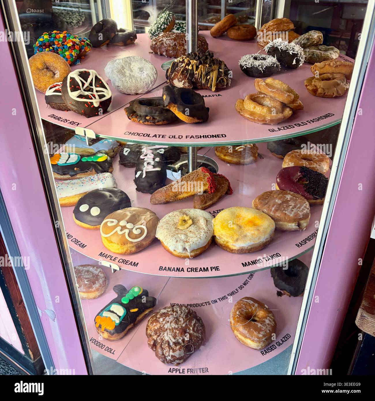 Doughnuts on a circular display. - Smartphone Captured Stock Image