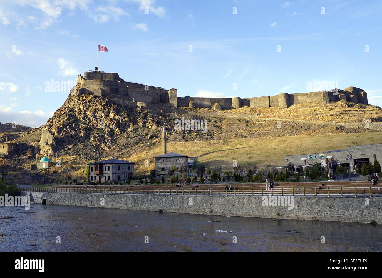 Massive black basalt stone walls and defensive ramparts of the Kars ...