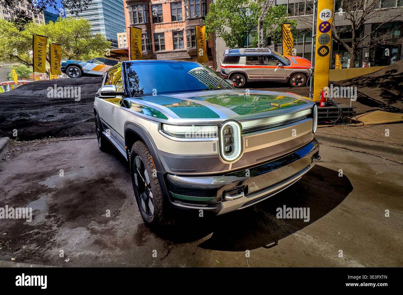 New Rivian R2s on display prior to their 2026 launch, at the 2026 SXSW (South by Southwest) technology and arts festival in Austin, Texas, USA - Smartphone Captured Stock Image