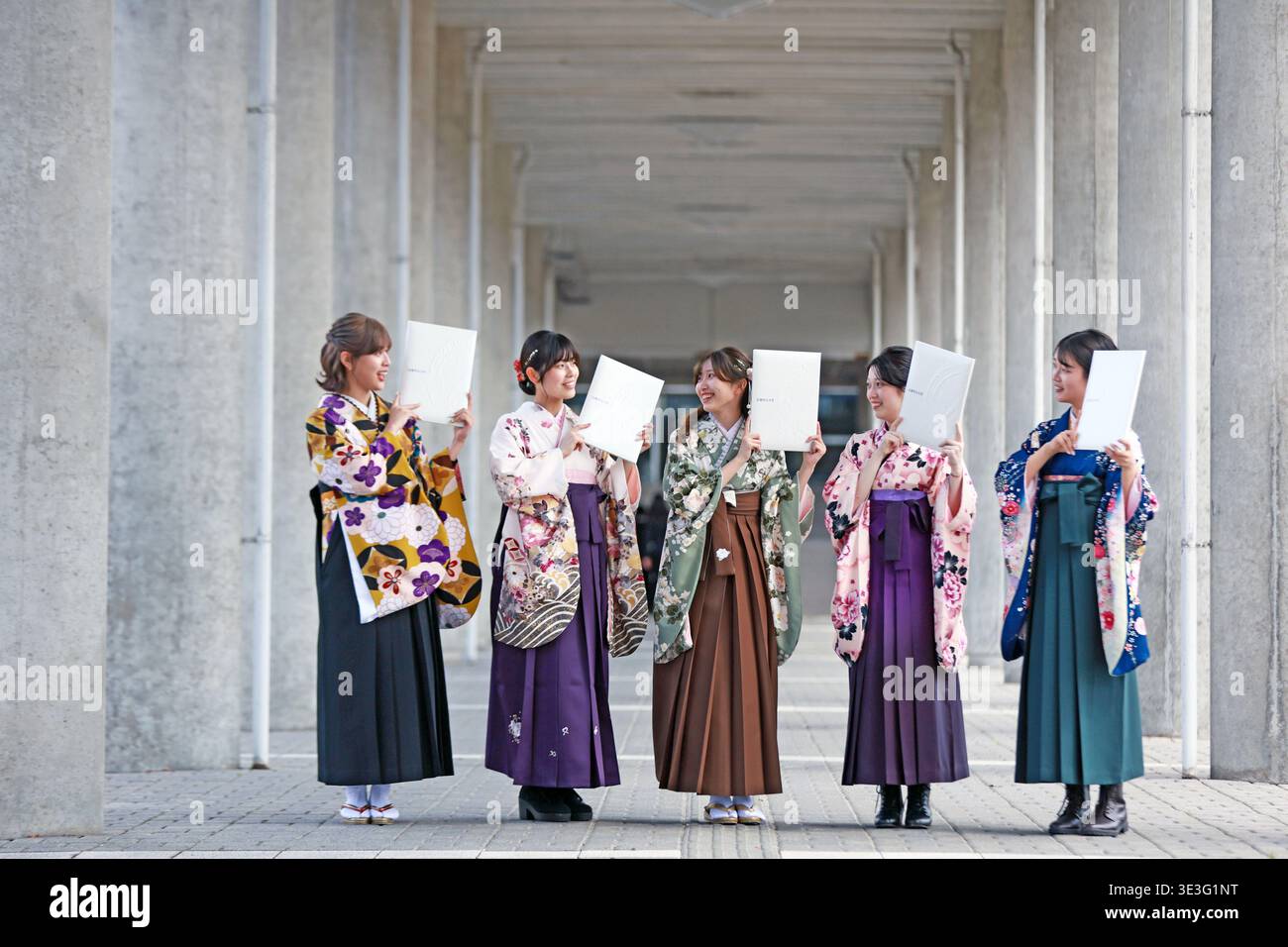 japanese graduation dress Graduates of Hiroshima City University show their diplomas after the ceremony in Hiroshima City, Hiroshima Prefecture on March 23, 2026. students often wear hakama, traditional Japanese lower garment, during graduation Product_Type|Long Dress