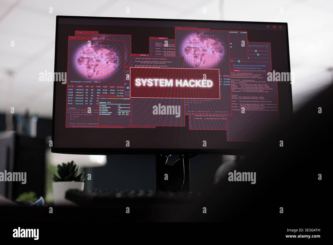Computers displaying hacked system alert message showing on screen, flashing security breach warning. Empty software developer big data office with multiple monitors running malfunction. Close up Stock Photo