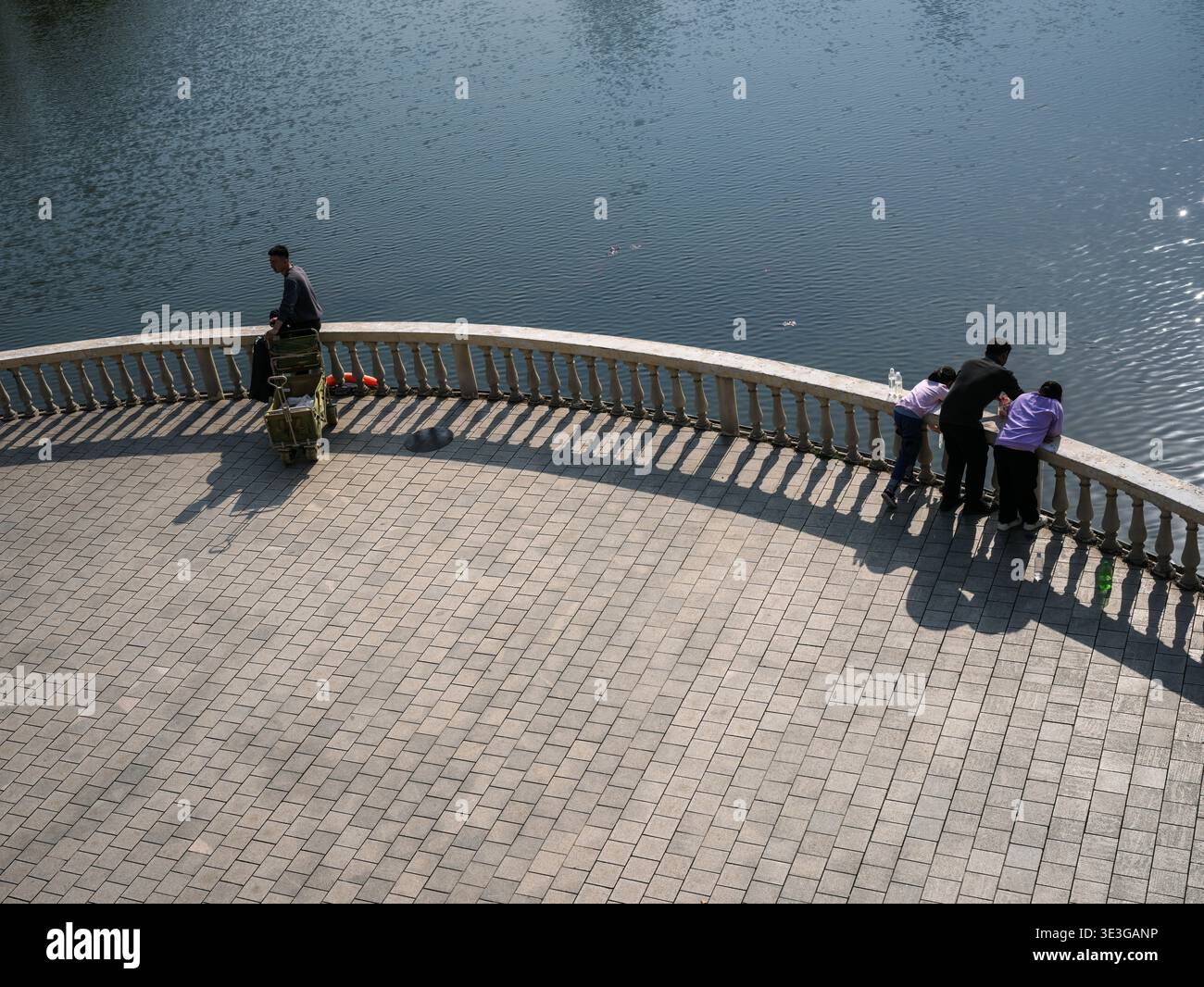 Reflective Environment Wuhan, China - March 22, 2025: A paved circular viewing platform with ...