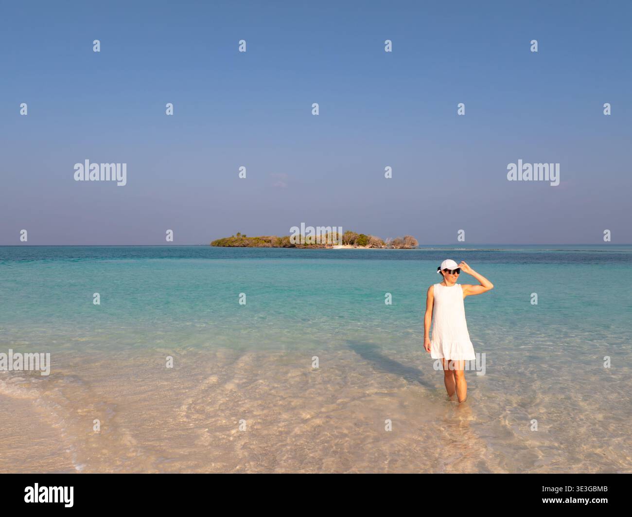 Woman in dress wading in water hi-res stock photography and images - Alamy