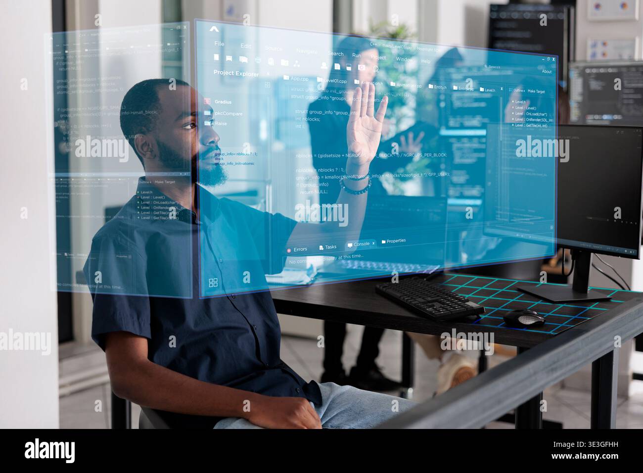 African american programmer working with hologram checking data while creating security system. Using holographic image and new interface for cloud computing, database code programming. Stock Photo
