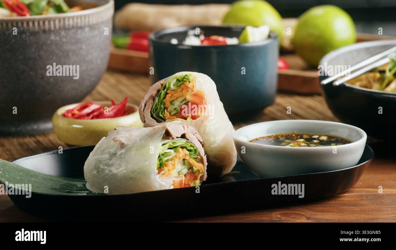 Fresh spring rolls with thinly sliced meat and crisp vegetables Stock Photo