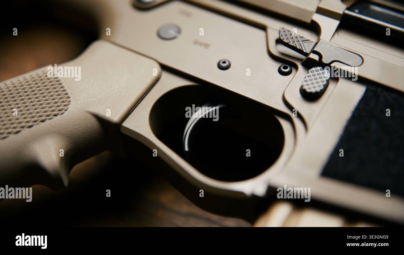 Modern tactical rifle with tan receiver and safety selector Stock Photo ...