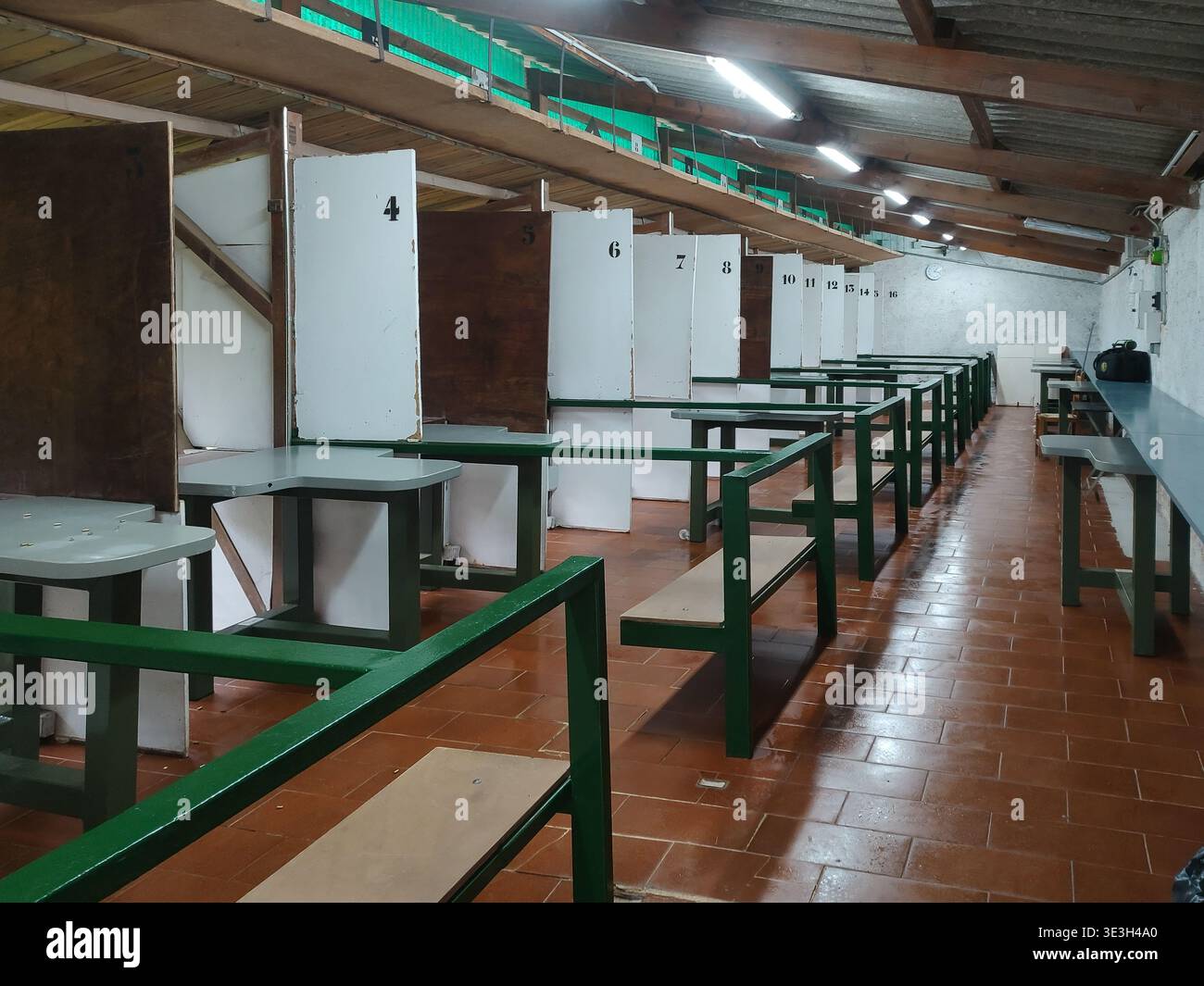 Interior view of a long distance shooting range facility featuring ...