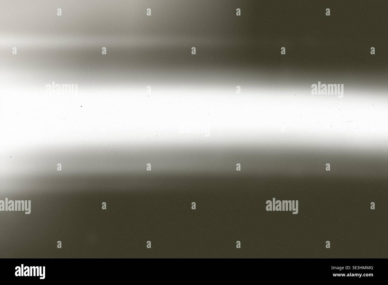 Soft gray gradient with subtle glow, distressed surface featuring noise and scratches, front view banner, ample copy space Stock Photo