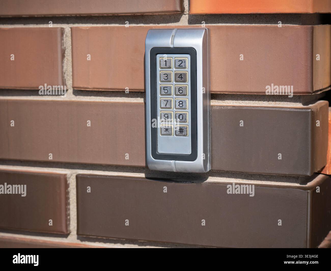 Electronic keypad on brick hi-res stock photography and images - Alamy
