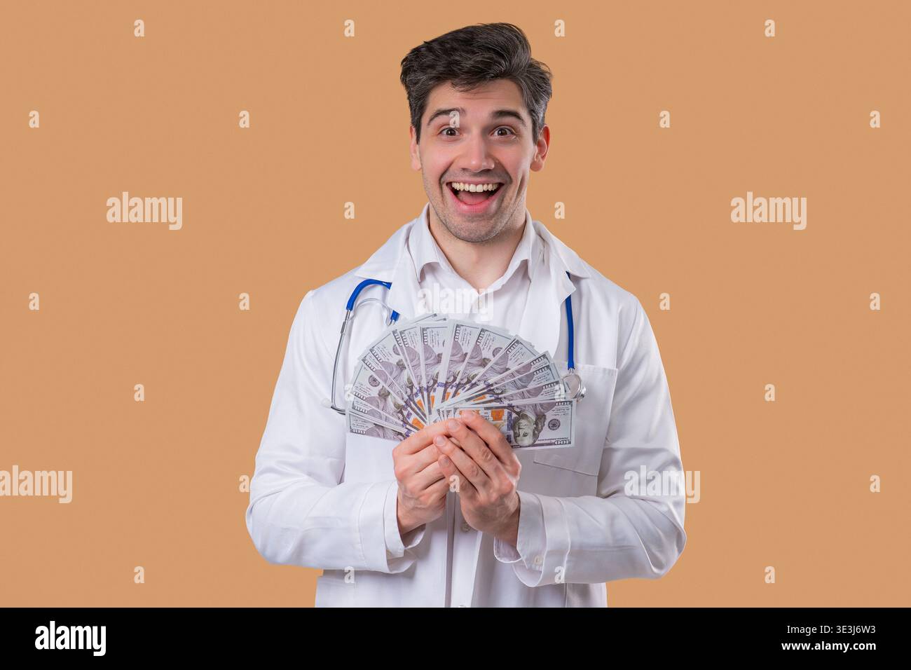 Rich Doctor Man With Usd Money. Handsome Medical Health Care Worker In White Stock Photo