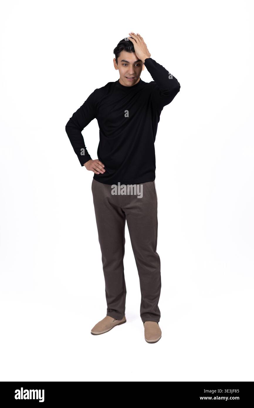 Man scratching his head and looking confused on white background Stock Photo