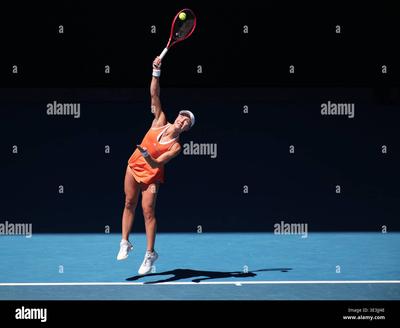 American tennis player Iva Jovic playing a service shot at the Australian Open 2026, Melbourne Park, Melbourne, Victoria, Australia. Stock Photo