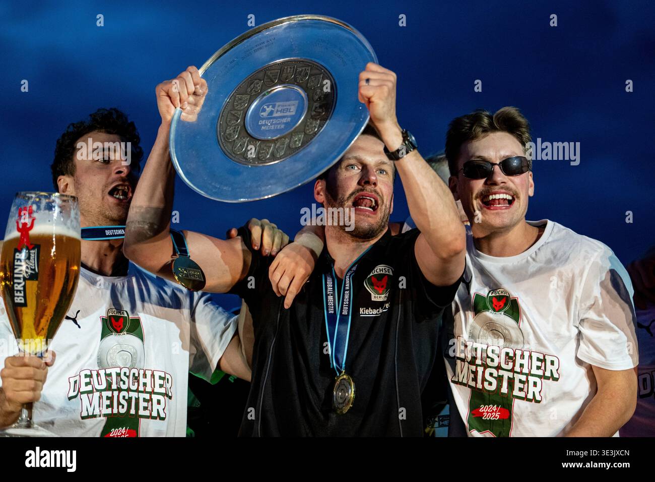 Members of Berlin's Handball team 'Die Fuechse', The Foxes, celebrate ...