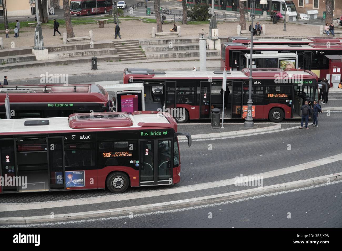 ATAC hybrid and electric buses parked at a terminal in Rome, Italy ...