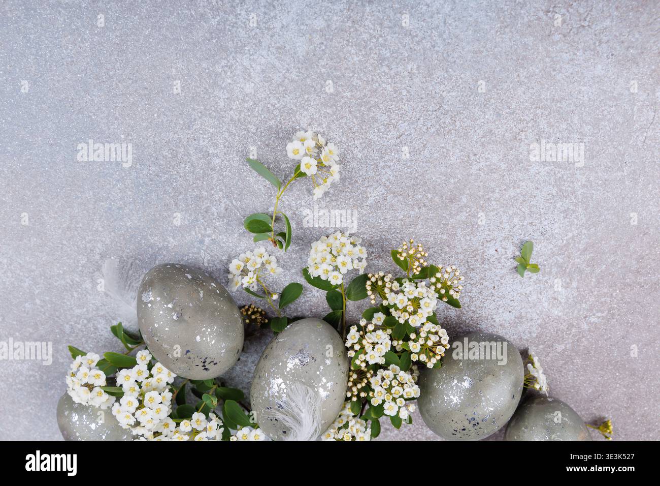 Easter eggs spring floral arrangement top view Stock Photo
