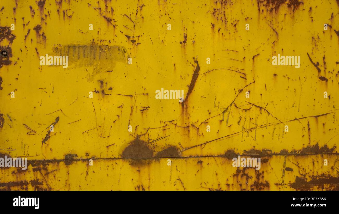Yellow rusty metal plate with scratches and corrosion grunge texture background - Smartphone Captured Stock Image