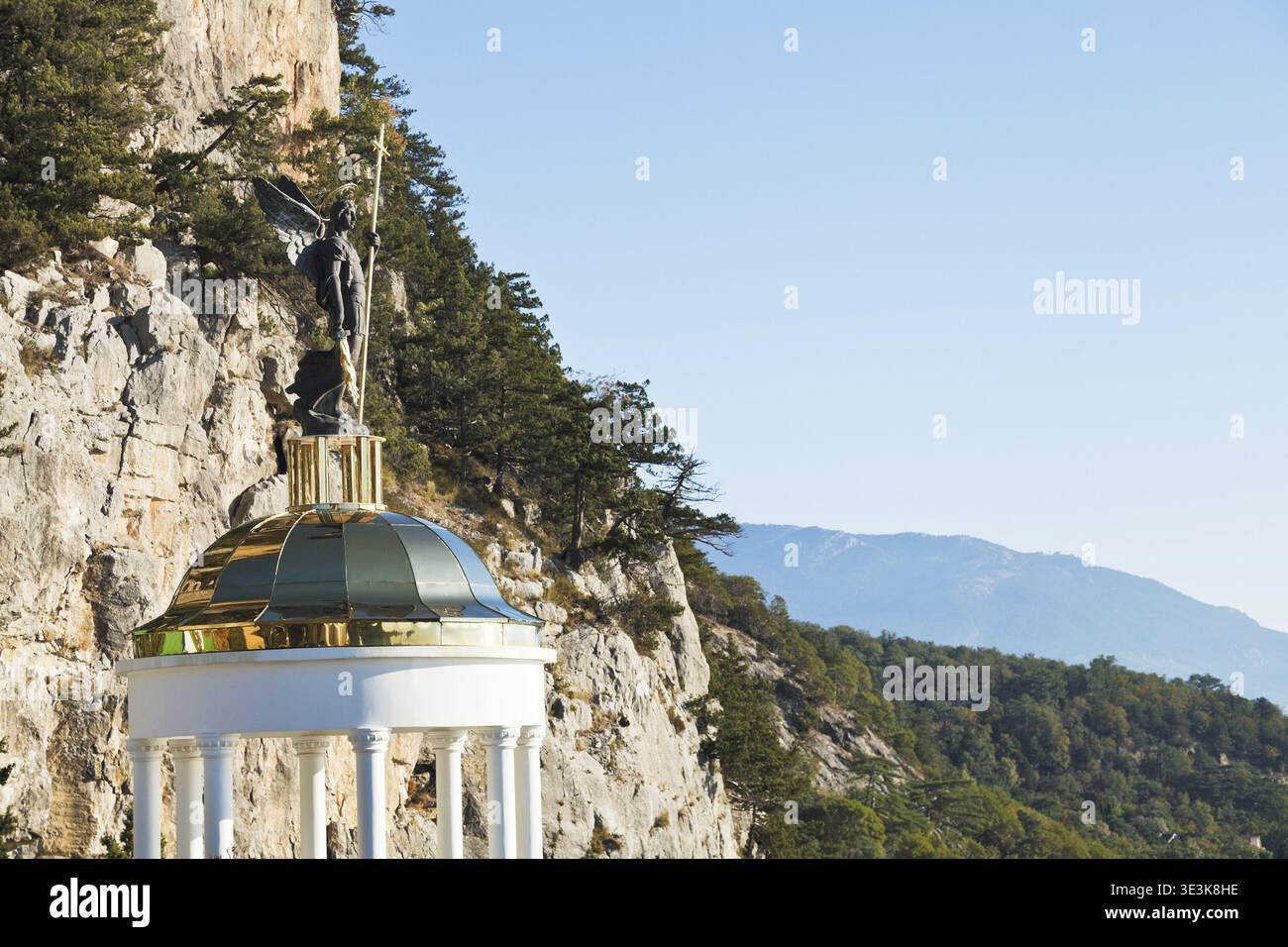 Statue of St. Michael the Archangel on a viewpoint near Ai Nikola Rock in Oreanda district on the south coast of Crimea Stock Photo