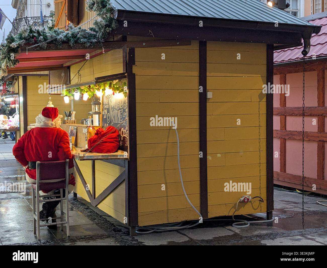 Santa Claus sat down to rest, kiosk. Belgrade, Serbia. - Smartphone Captured Stock Image