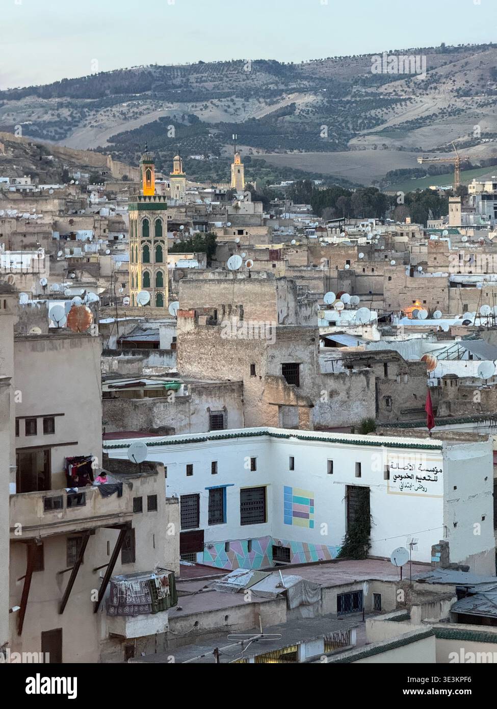 Walk through Fes, Morocco, featuring atmospheric streets, traditional Islamic architecture and the timeless character of the medina. - Smartphone Captured Stock Image