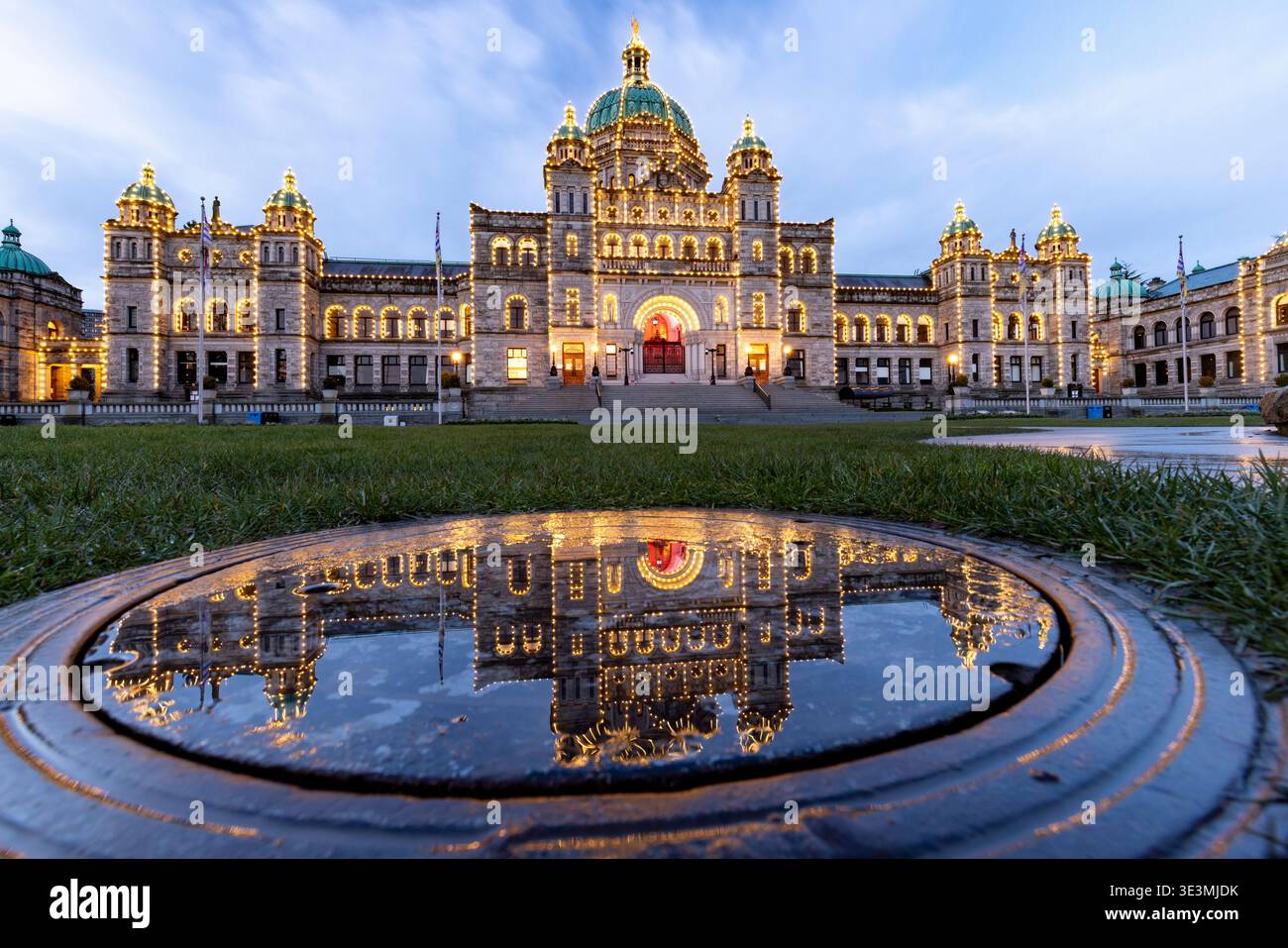 Reflections of British Columbia Parliament Buildings in the early morning light - Victoria, Vancouver Island, British Columbia, Canada Stock Photo