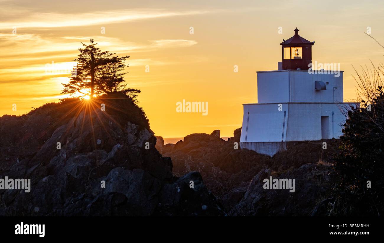 Sunset at Amphitrite Point Lighthouse - Ucluelet, Vancouver Island, British Columbia, Canada Stock Photo