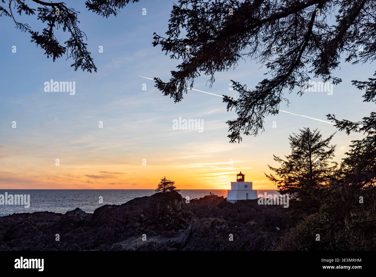 Sunset at Amphitrite Point Lighthouse - Ucluelet, Vancouver Island, British Columbia, Canada Stock Photo