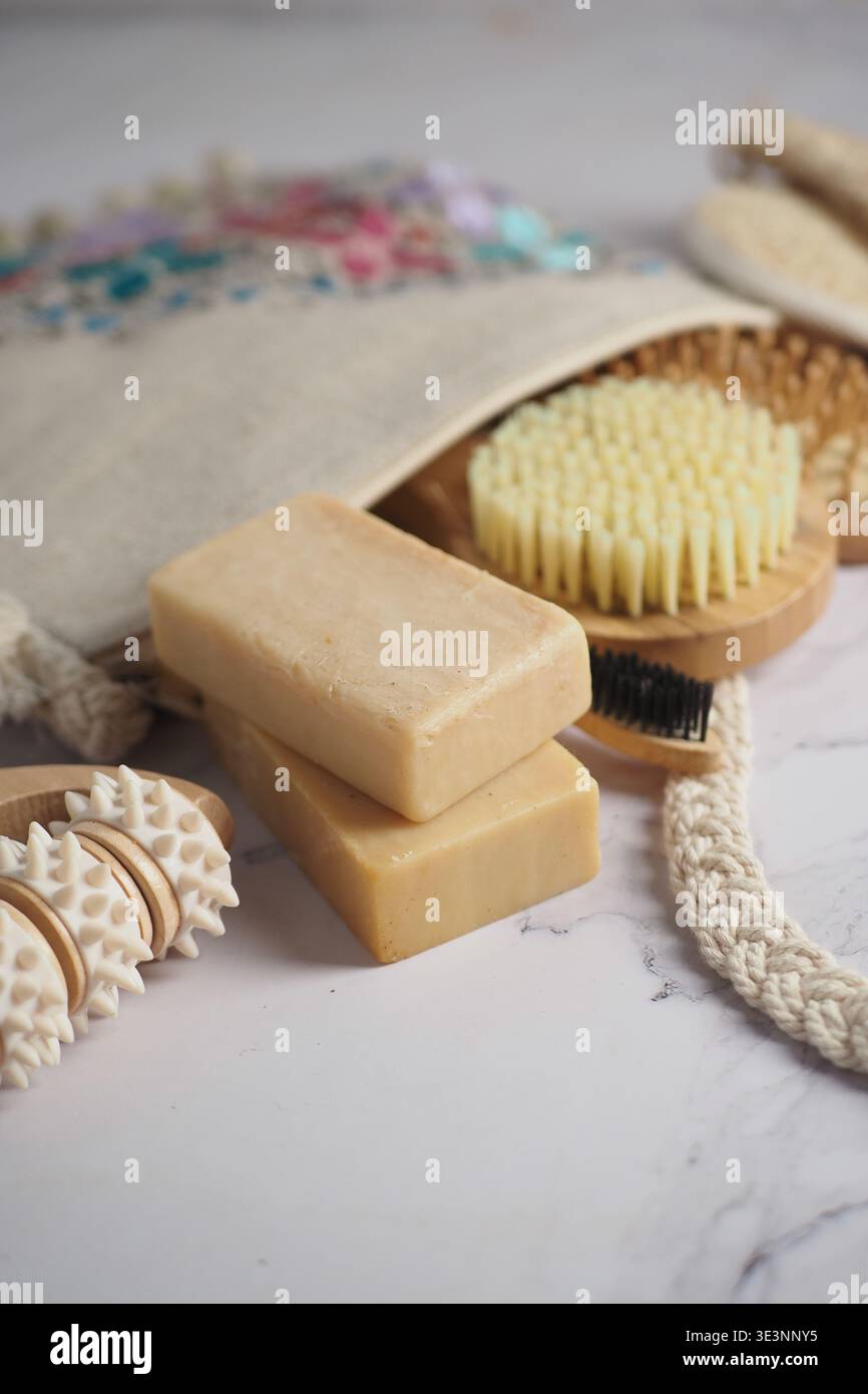 Natural soap and brushes on a white surface Stock Photo