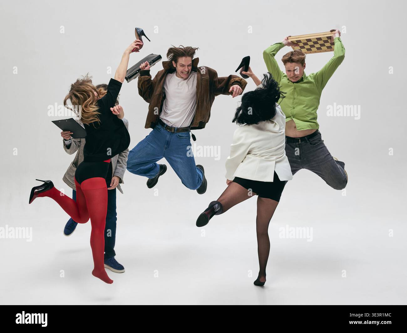 Aggressive Object Group of people jumping and throwing objects in chaotic aggressive ...