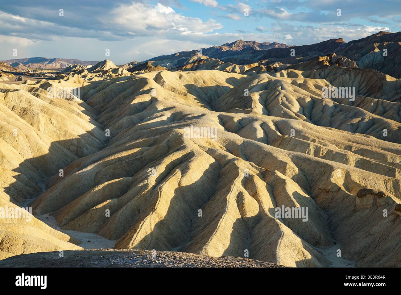 Barren desert landscape with textured ridges hi-res stock photography ...
