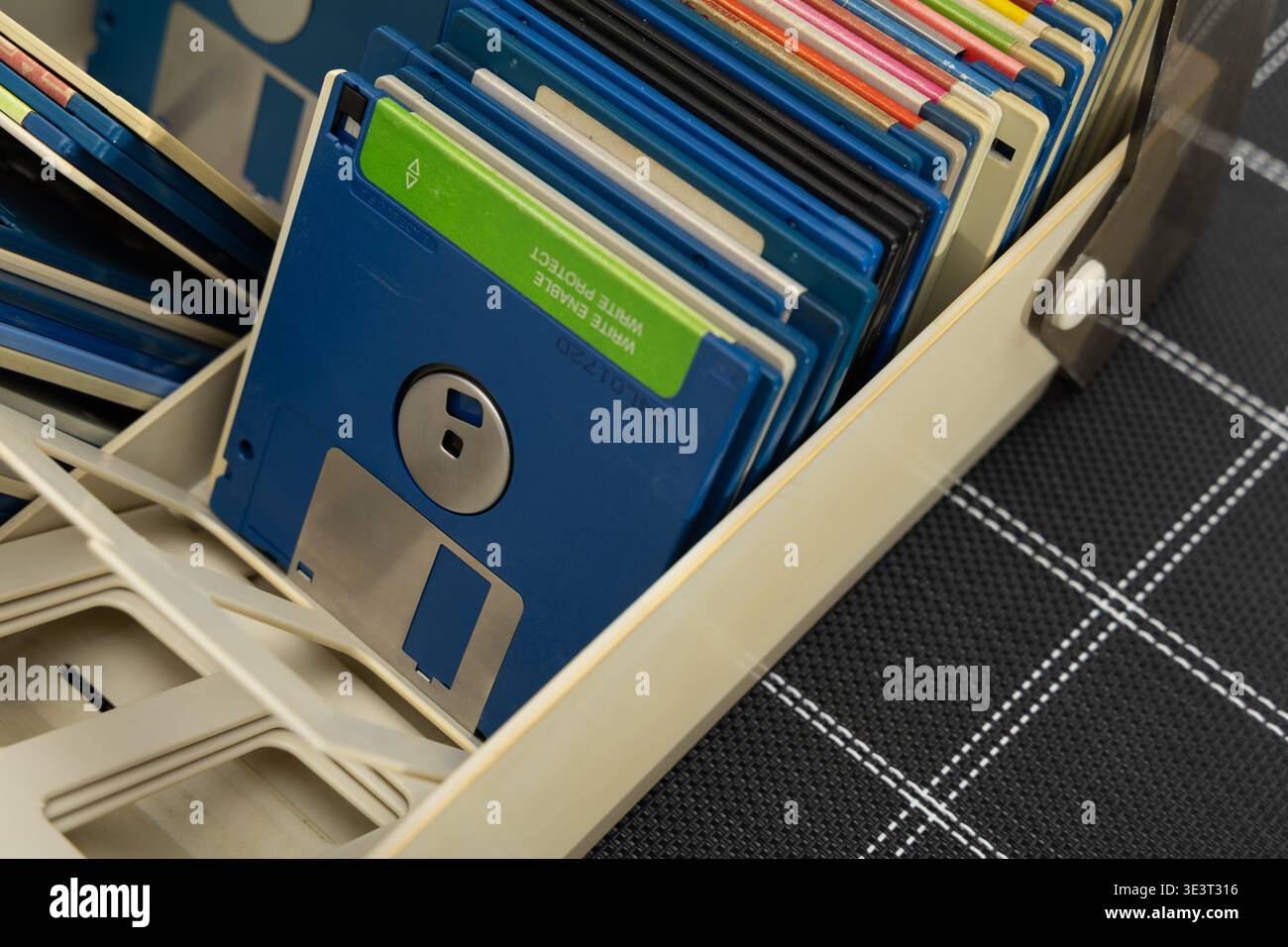 A box of old 3.5-inch floppy disks, colorful floppy disks for 8-bit ...