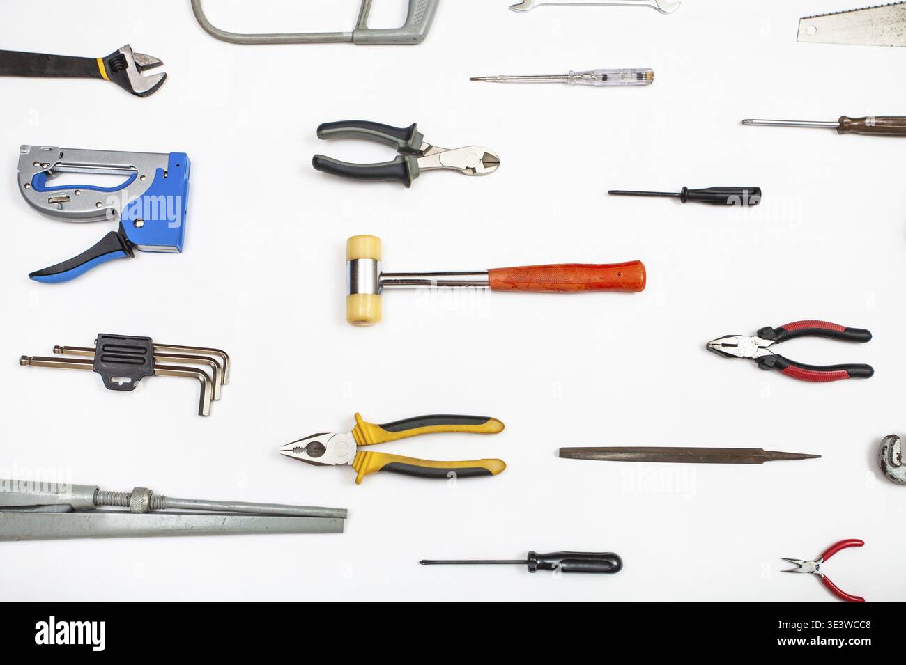Various hand tools arranged on white background Stock Photo