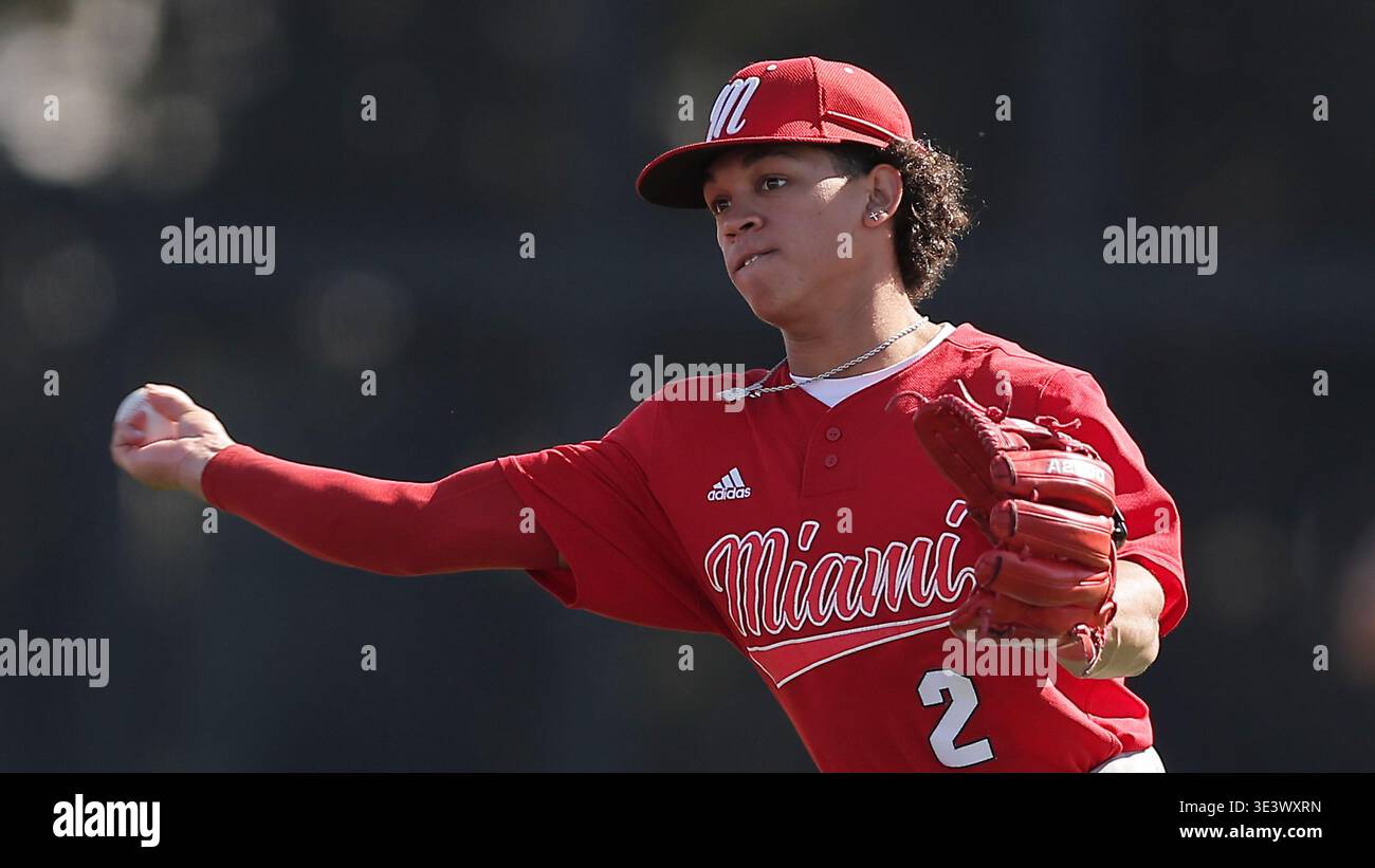 Miami OH Diego Cruz (2) throws to first base during an NCAA baseball ...