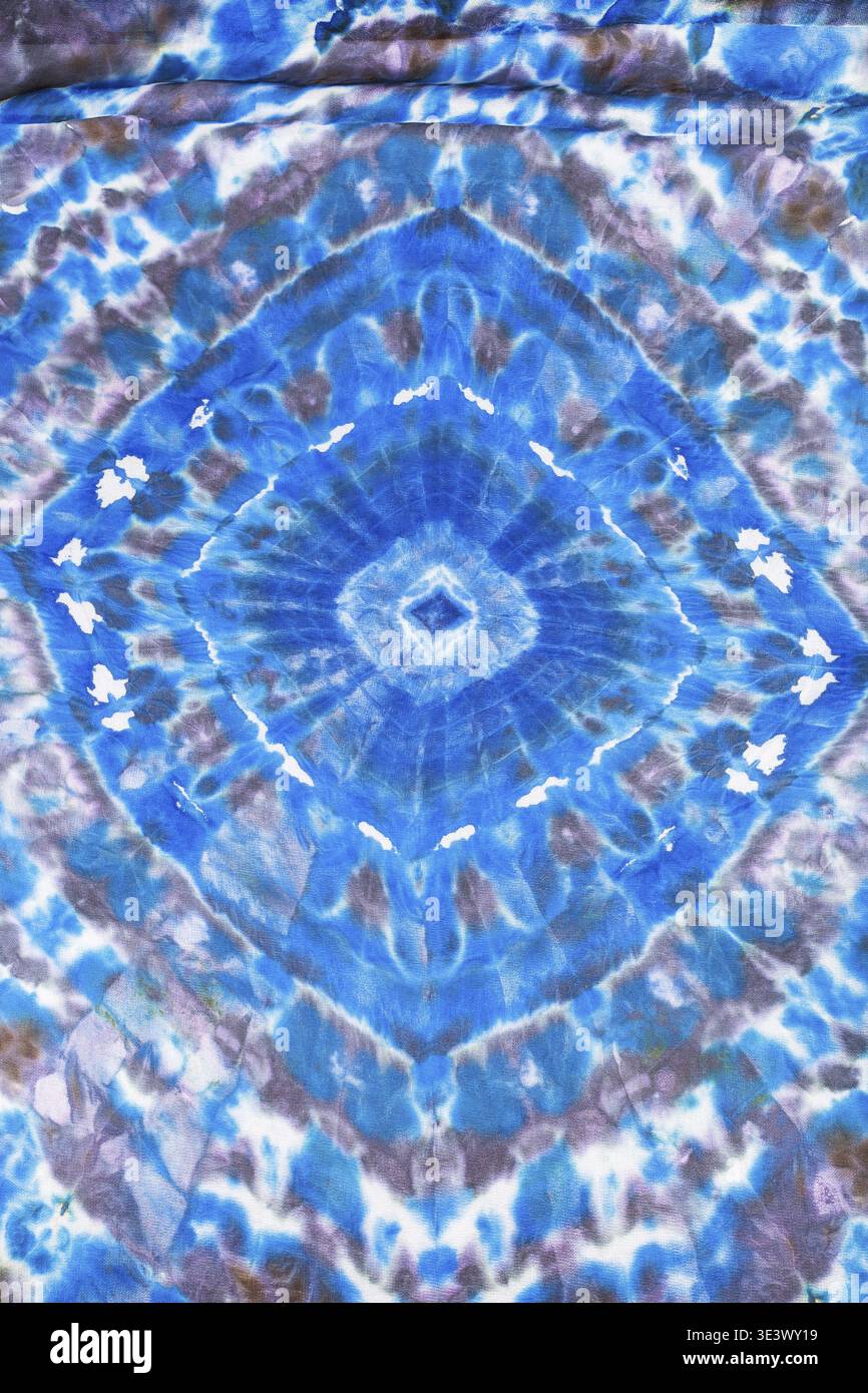 Silk scarf with abstract blue geometric pattern, hand painted using knot technique Stock Photo