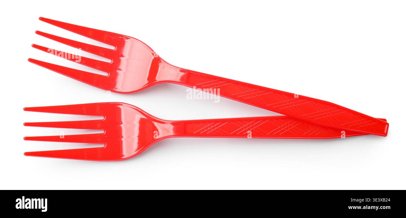 Two red plastic forks isolated on white, top view Stock Photo