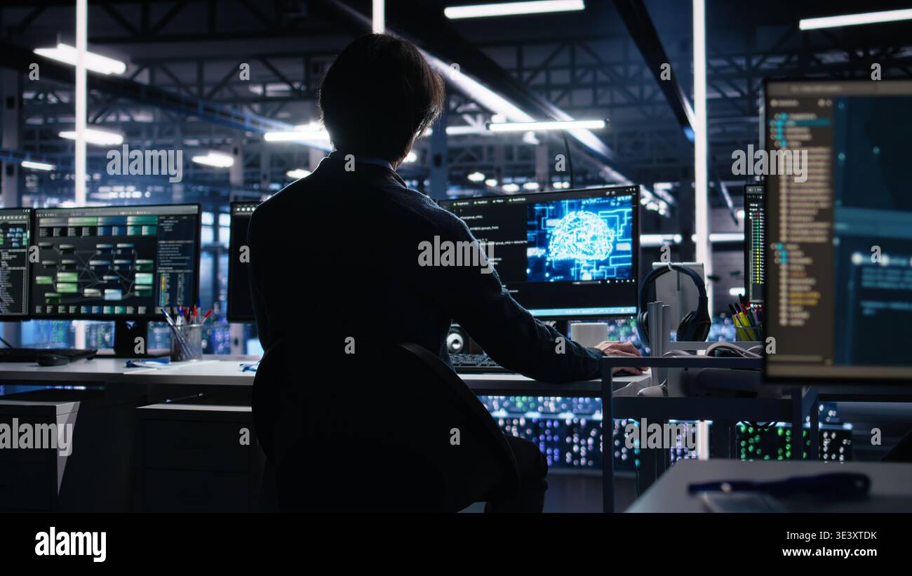 Admin in server room drinks coffee while using AI to review infrastructure diagnostics. IT specialist enjoys beverage in data center while analyzing performance with artificial intelligence, camera A Stock Photo